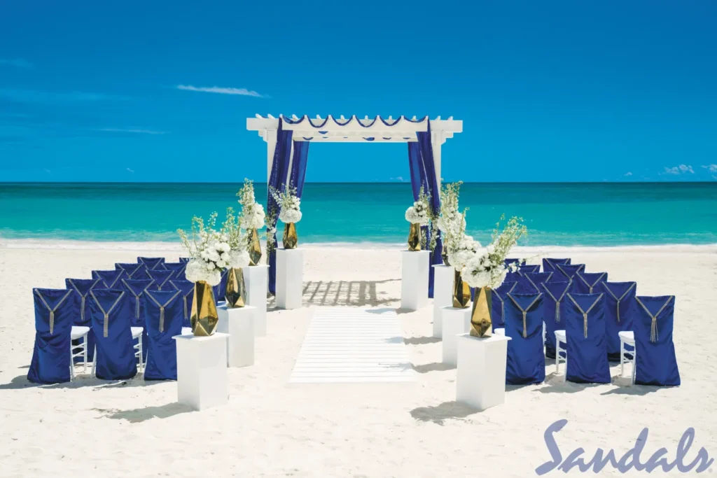 A beach wedding with blue and white decor